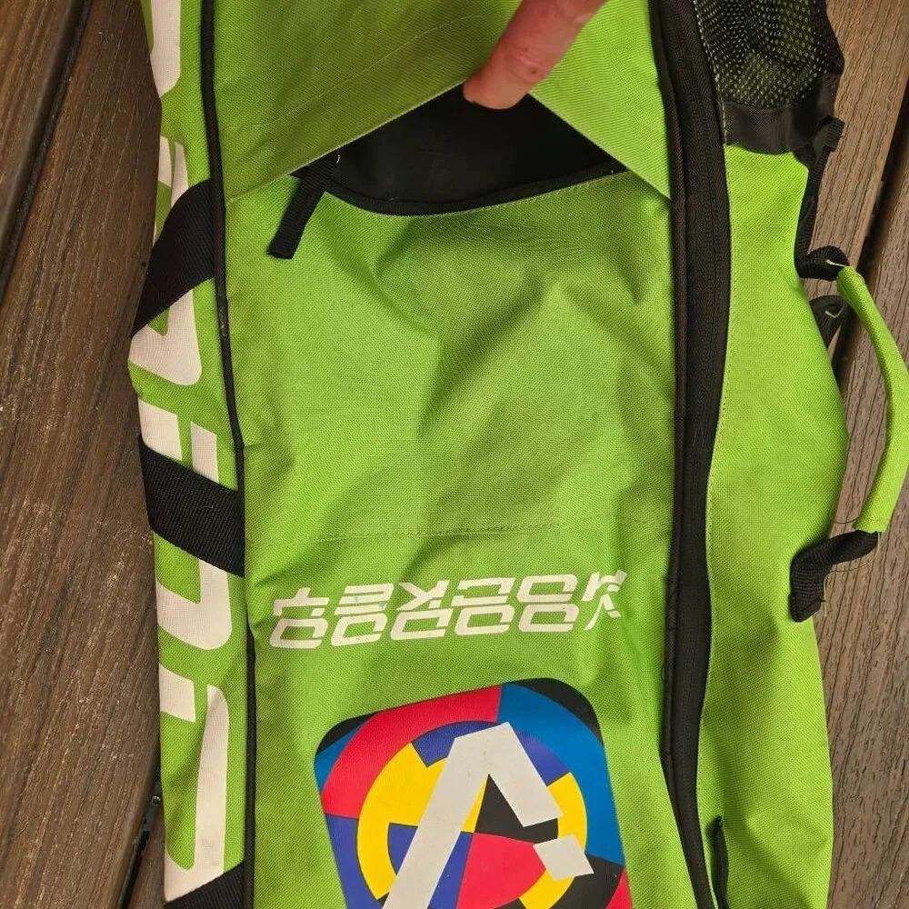 Voodoo Hockey Bag green and black back pack straps easy carry, pockets